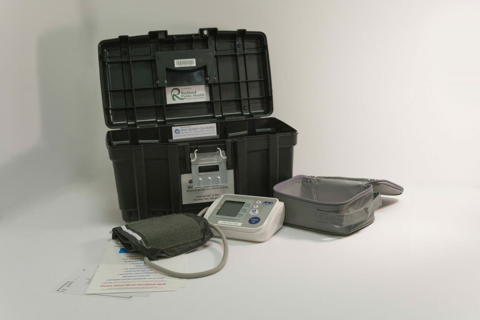 Blood Pressure cuff with instruction packet and storage compartment