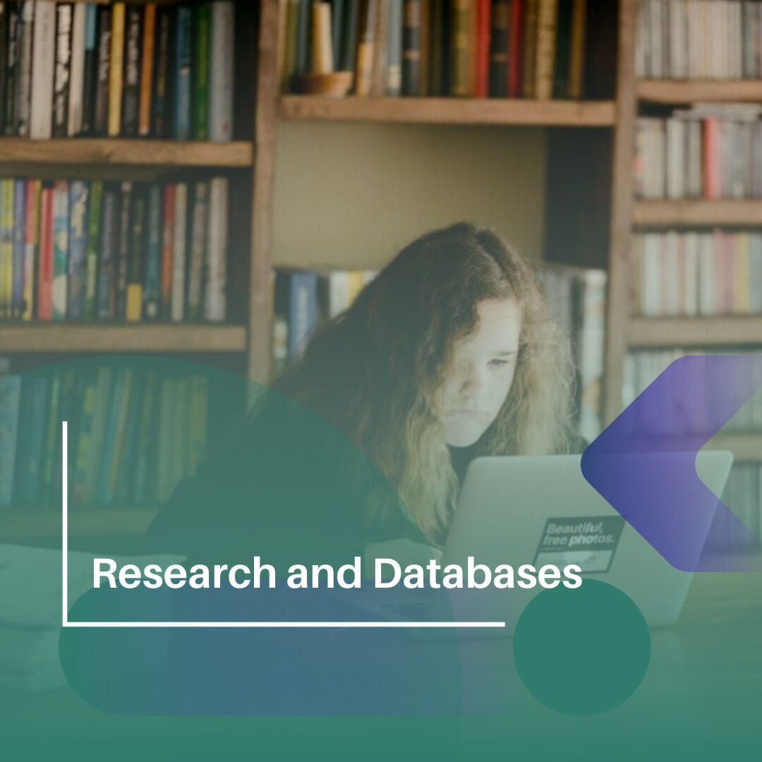Link to Research and Databases page with person in a library studying on a laptop.