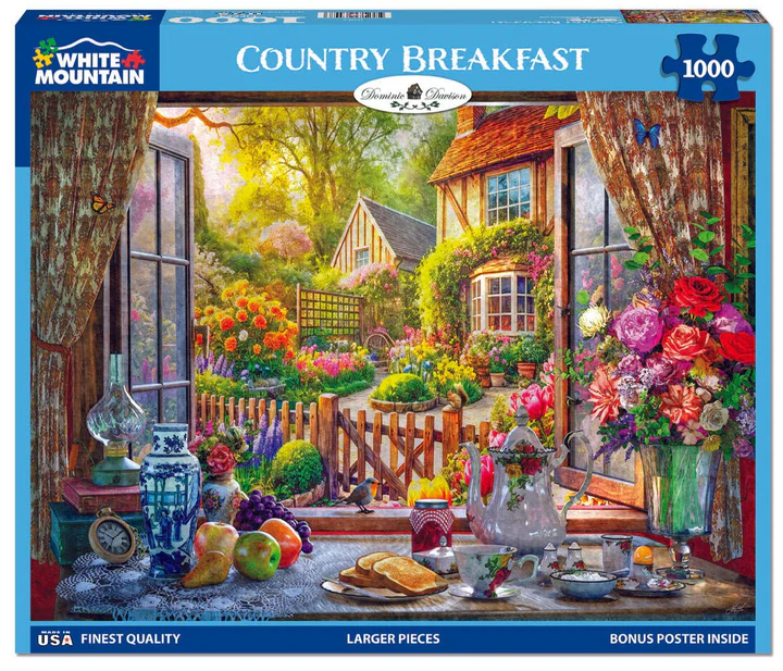 A beautiful terrace breakfast overlooking greenery and cottages